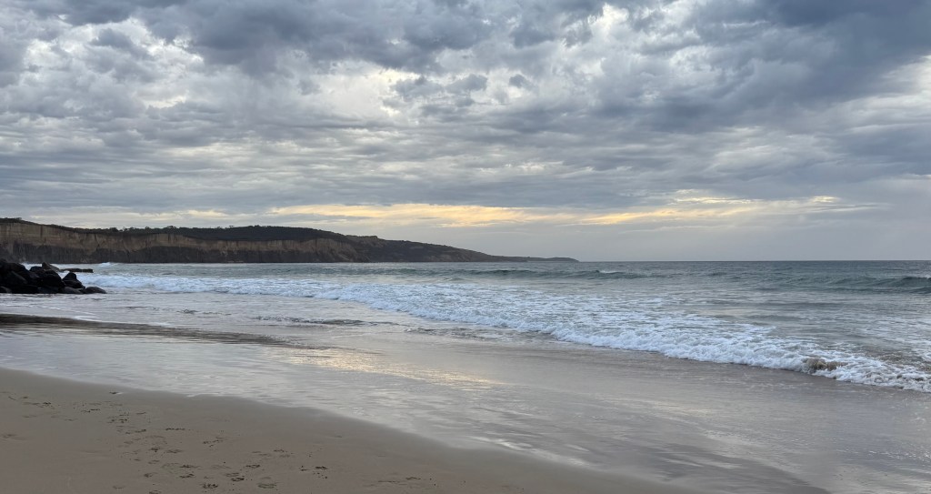 The clouds changed how we saw the beach where we were for a walk even though we knew the blue sky days would come again...